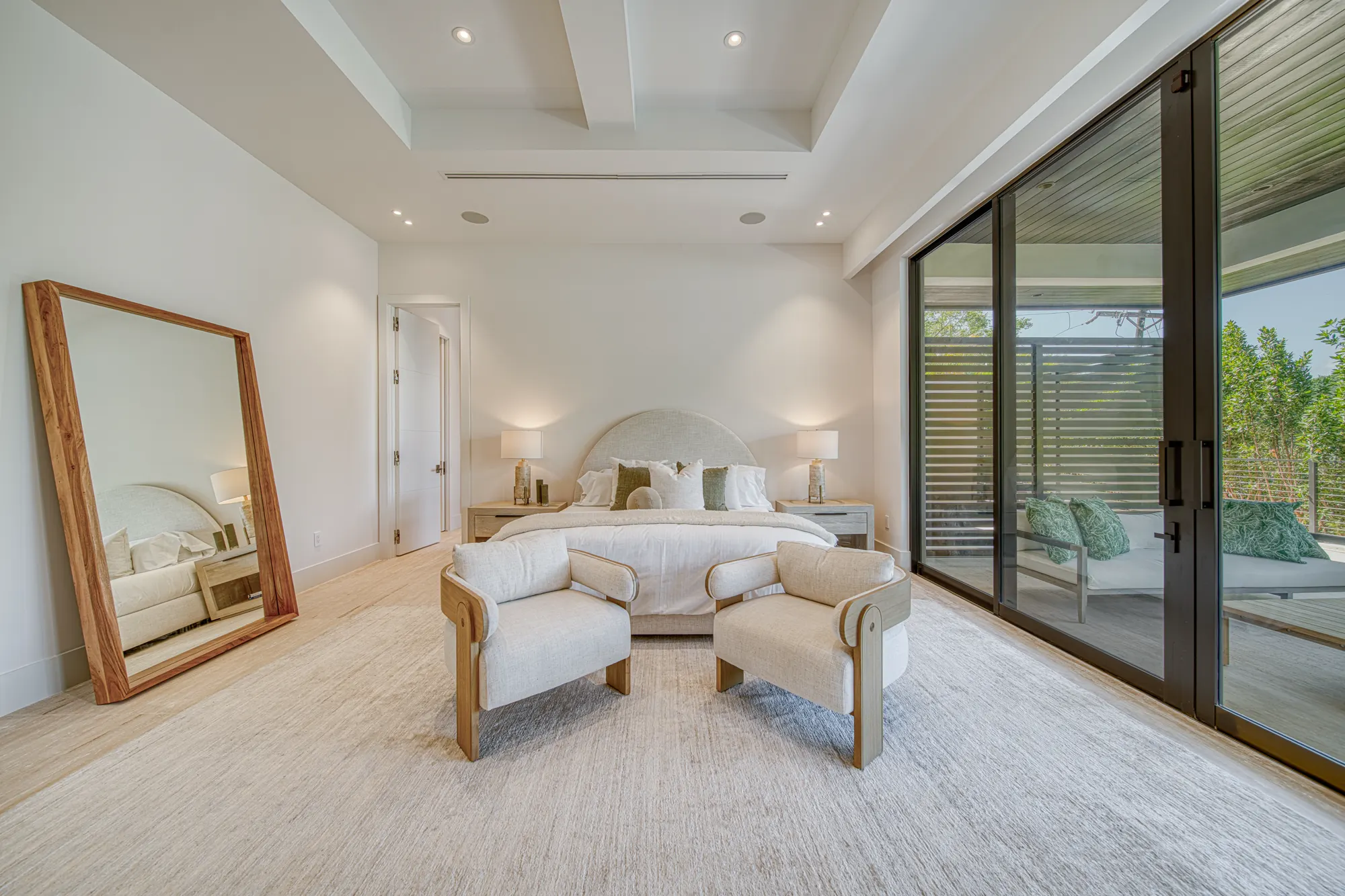 Bedroom with open curtains and natural light